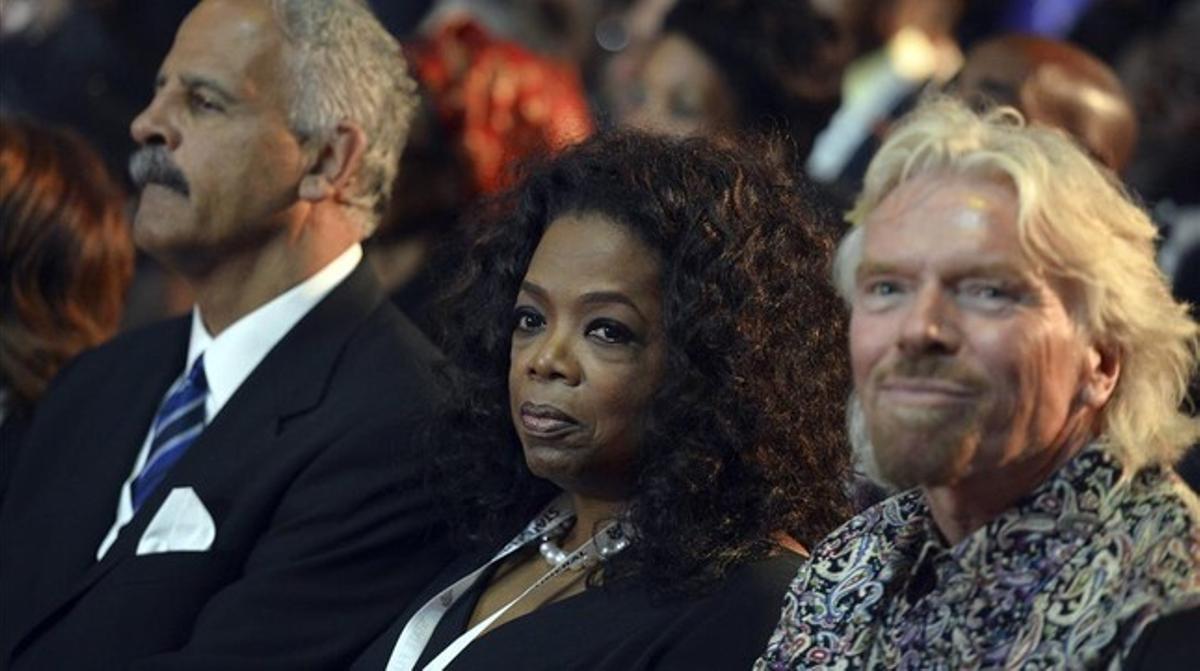 Oprah Winfrey i Richard Branson en els funerals per Nelson Mandela a Qunu