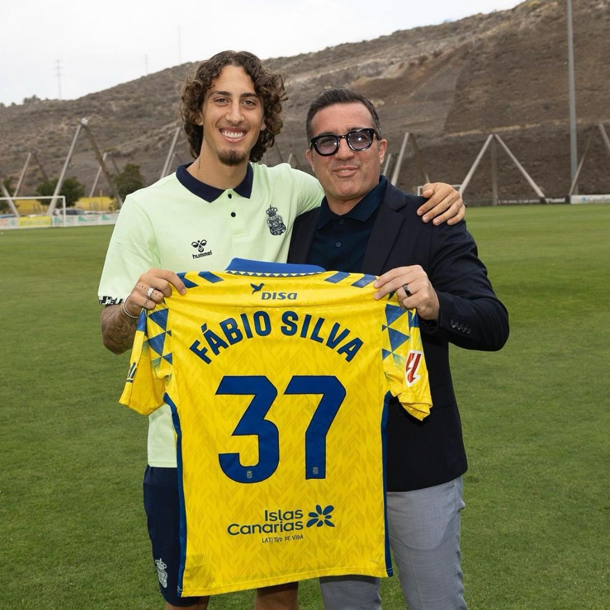 Silva y su agente, Carlos Oliveira.