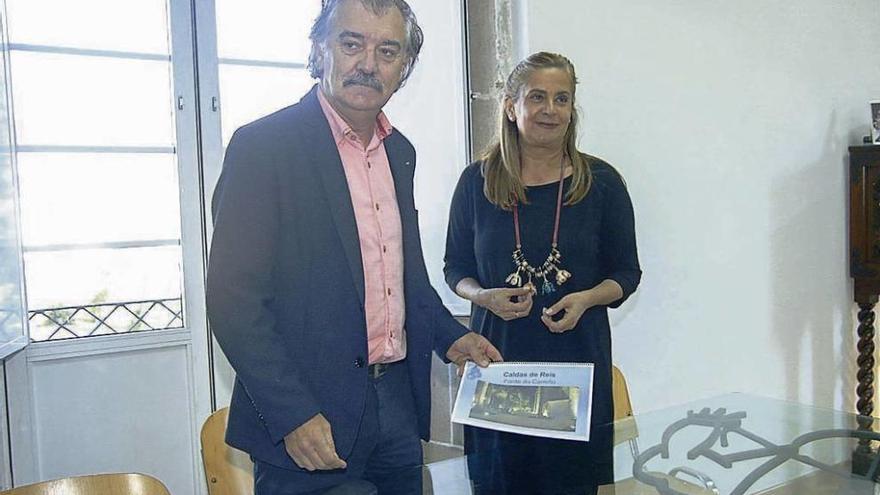 Juan Manuel Rey y Carmela Silva durante la reunión en Caldas. // FdV.