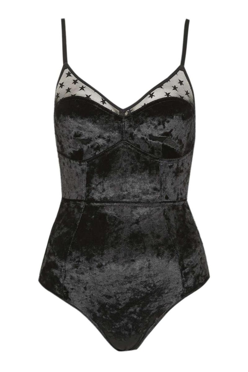 Body de terciopelo con estrellas de Topshop (32€)