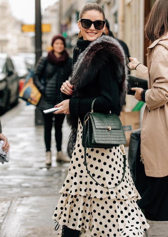 Olivia Palermo con vestidos de lunares y botas militares