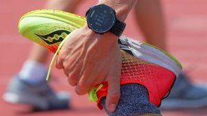 zentauroepp54223577 a runner wearing a garmin smart watch  a device which stanfo200728184256