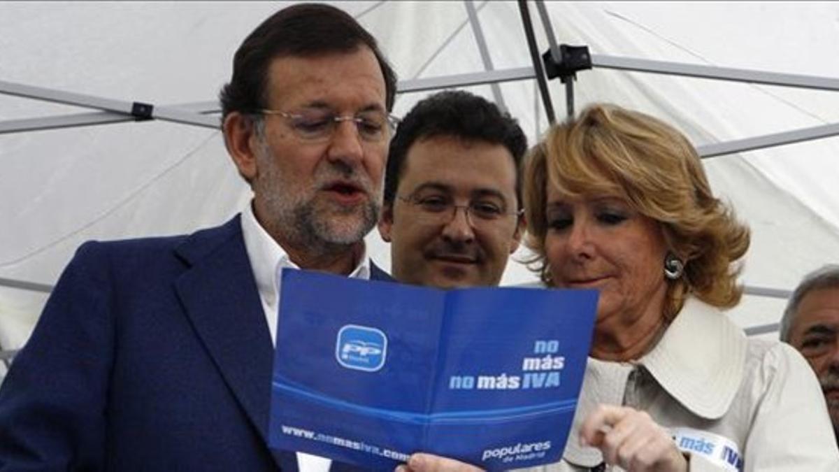 Rajoy y Aguirre, en el 2010, en un mitin contra el IVA cultural que después el PP acabó subiendo.