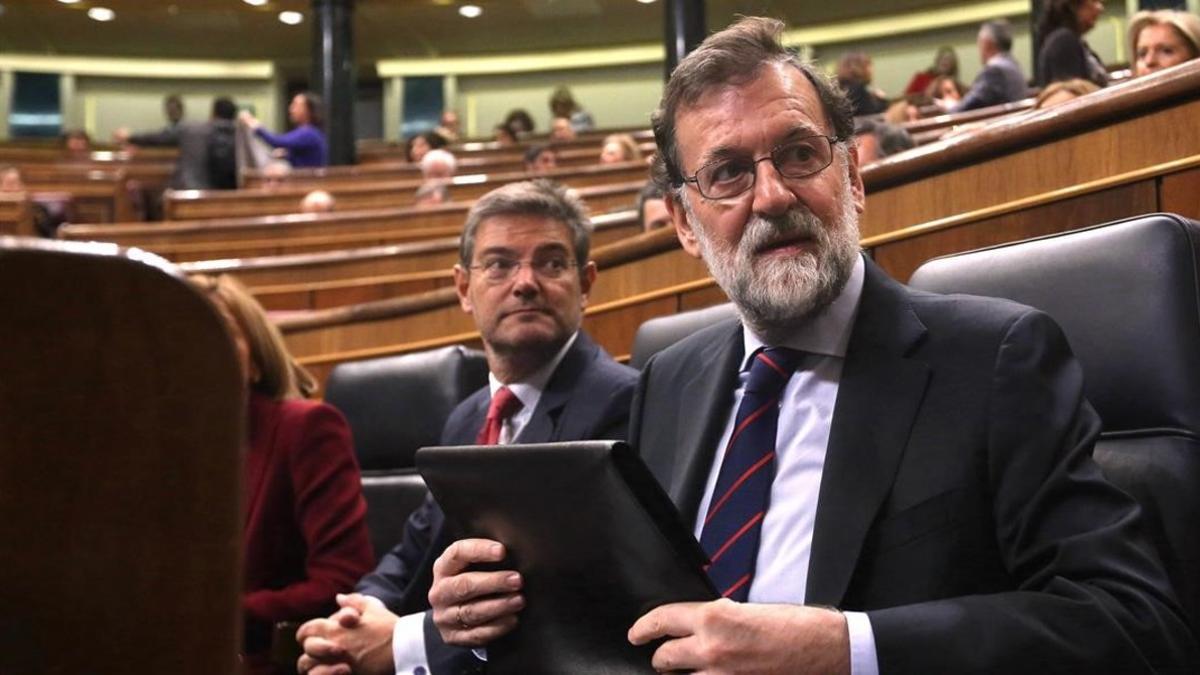 Mariano Rajoy, junto a Rafael Catalá, el pasado miércoles en el Congreso.