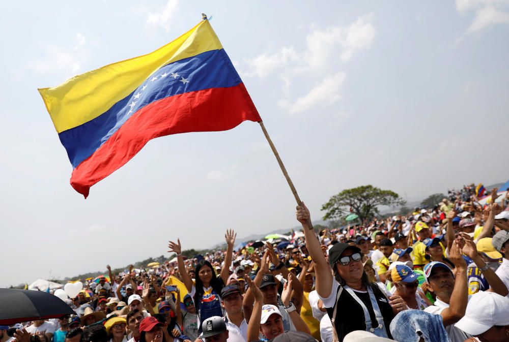 People attend the "Venezuela Aid Live" concert ...