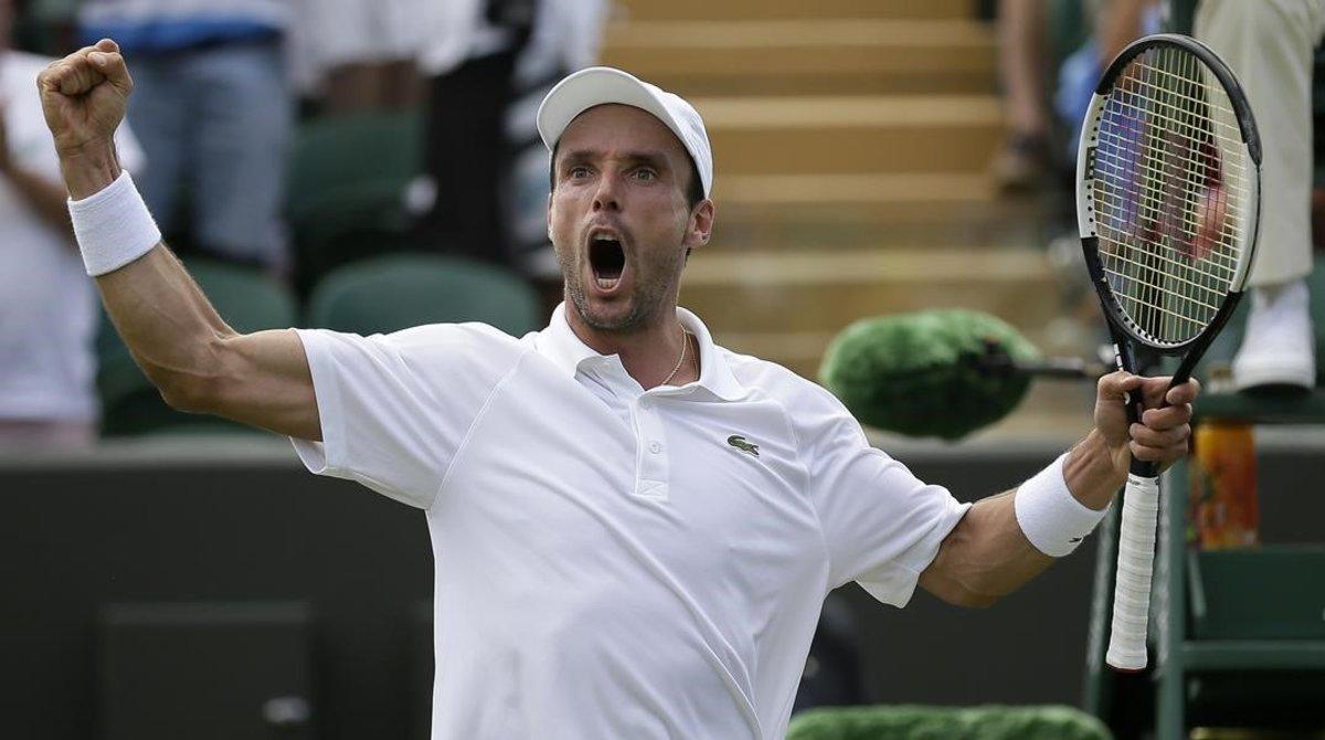 jdomenech48947155 spain s roberto bautista agut celebrates after beating russi190705163038