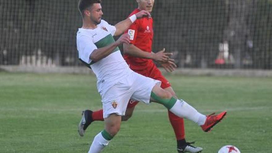 Un instante del partido de ayer en Elche.