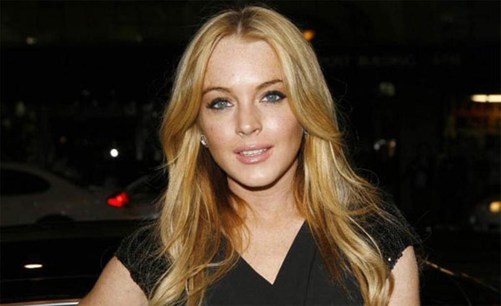 Detienen a un fan de Lindsay Lohan por intentar agarrarla