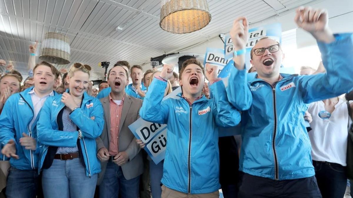 victoria de partido de merkel en Schleswig-Holstein