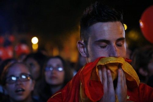 Supporters of Madrid react after the announcement that Madrid has been eliminated from IOC's voting process to select the host city for the 2020 summer Olympic Games, at Madrid