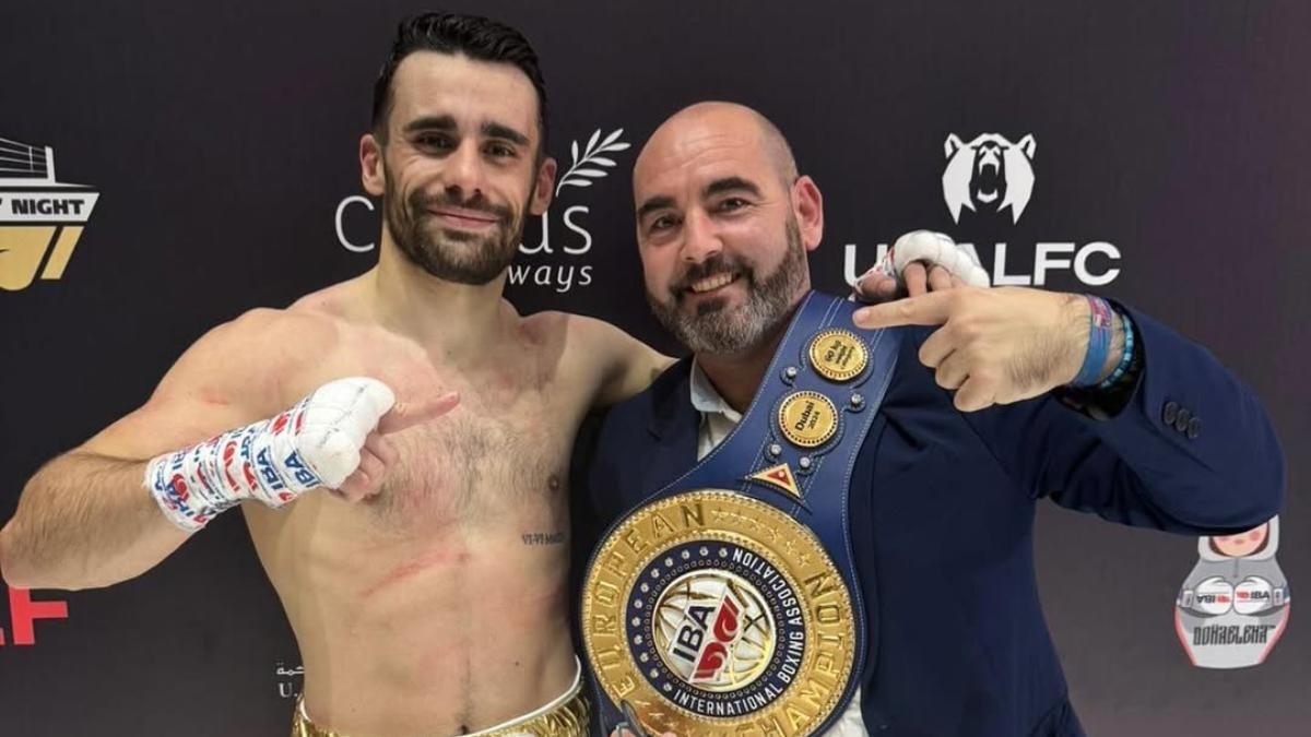 El presidente federativo español Felipe Martínez, con el olímpico José Quiles