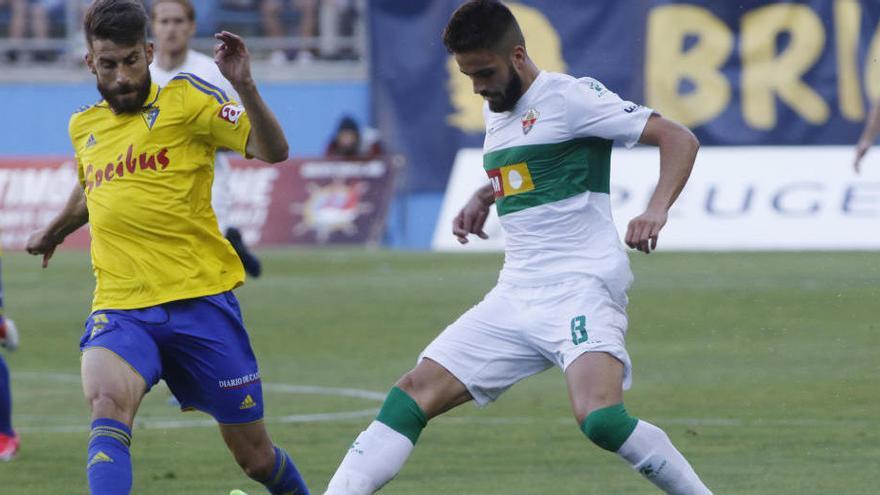 El ex oviedistas Pelayo en el partido de ayer ante el Cádiz