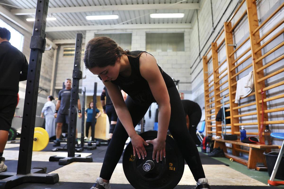 EN IMÁGENES: Inés Conde, ocho veces campeona de España de halterofilia, en un entrenamiento. EN IMÁGENES: Inés Conde, ocho veces campeona de España de halterofilia, en un entrenamiento.
