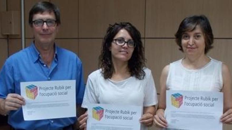 Joan Vinyes, Flori Mèrida i Isabel Ledesma, presentant el projecte Rubik.