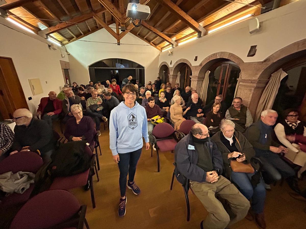 La deportista, entre el público.