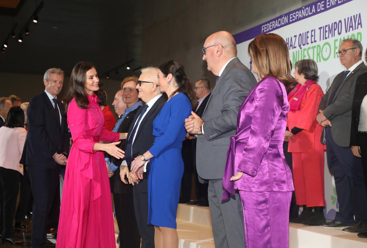 La reina, en el saludo a los asistentes antes del iniciarse el acto.