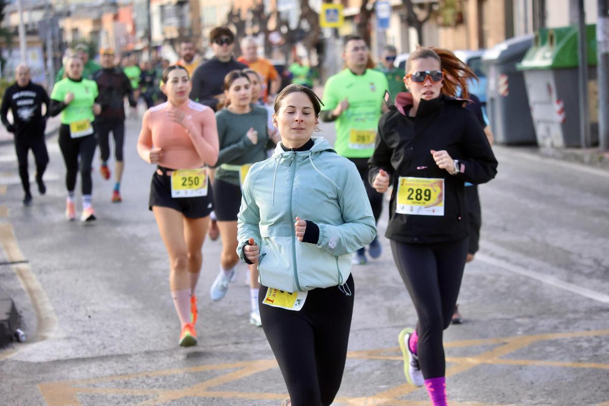 Las imágenes de la carrera popular solidaria en el barrio de El Progreso