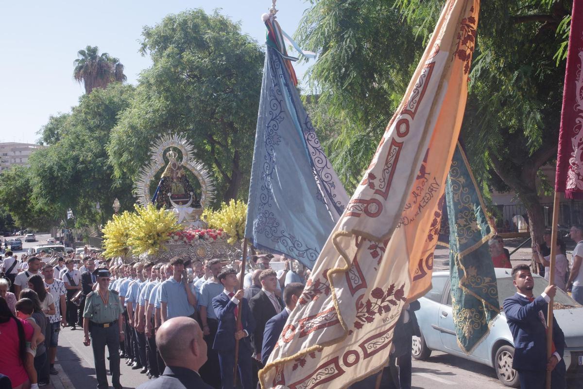 Salida procesional de la Virgen de la Cabeza, en Málaga