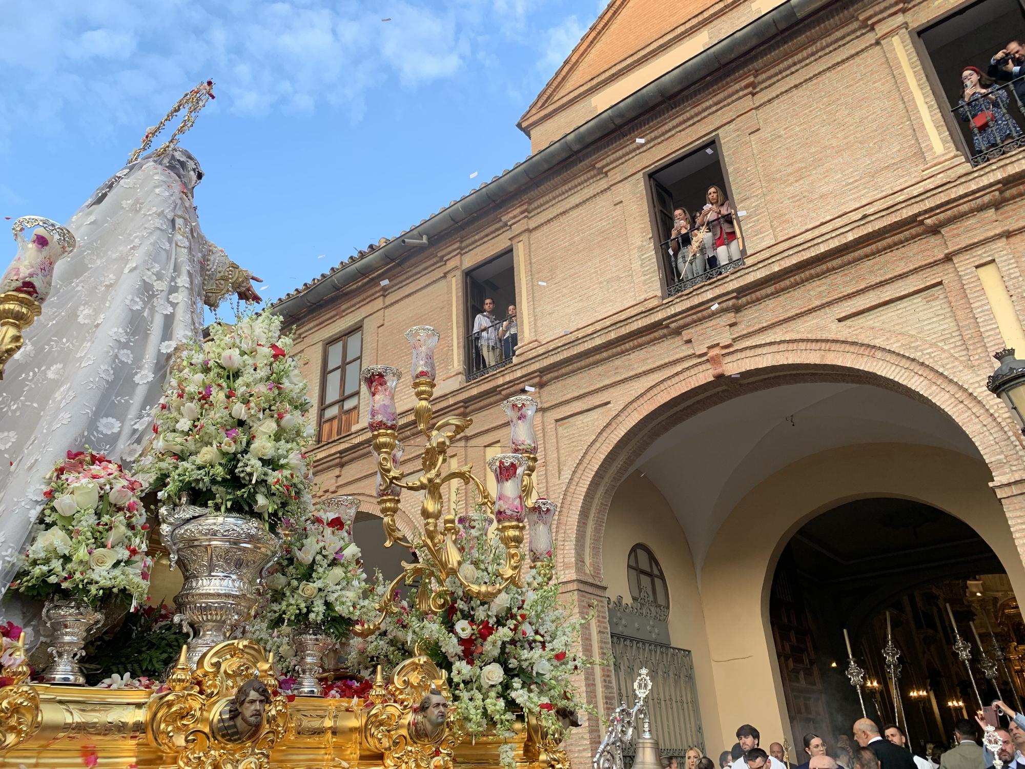 La procesión de la Virgen del Rocío por la Victoria y Lagunillas, en imágenes