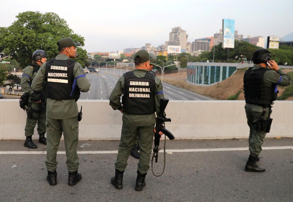 Military members stand near the Generalisimo ...