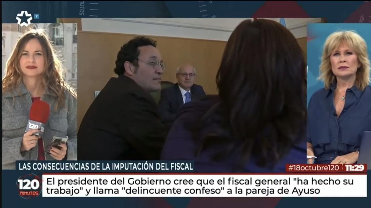 La reportera de Telemadrid, intentando informar sobre fiscal general del Estado