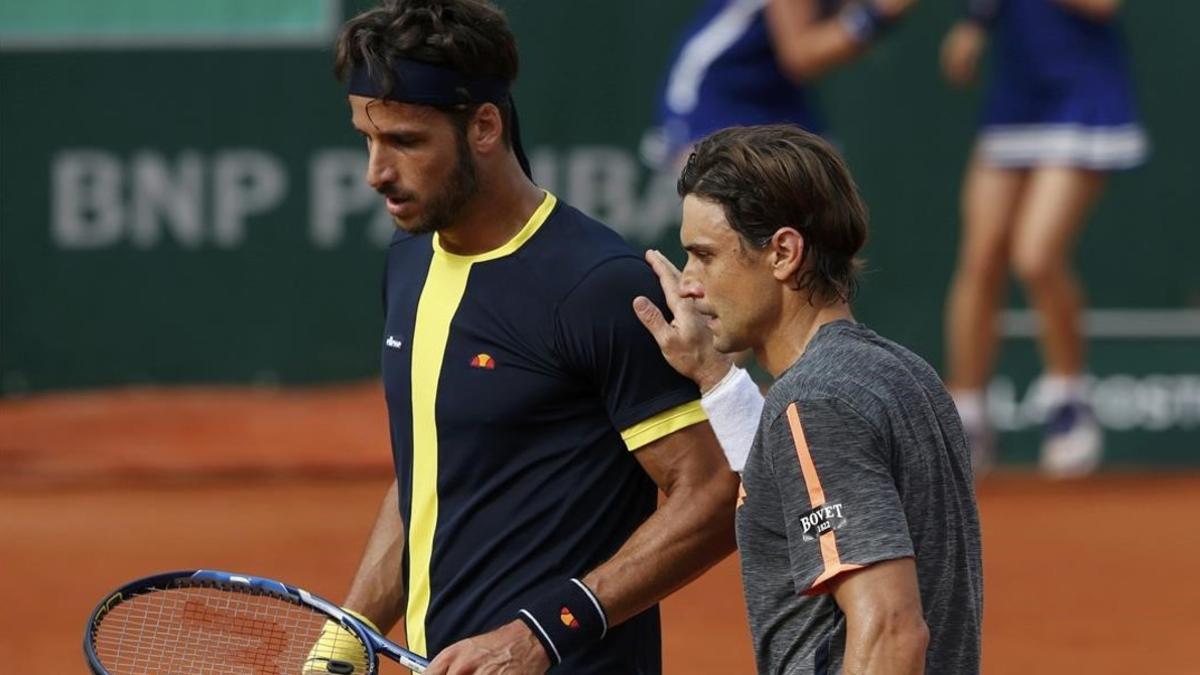 Ferrer y Feliciano, tras su partido del sábado en Roland Garros. El alicantino irá a Río, y el toledano ha renunciado por cuestión de calendario.