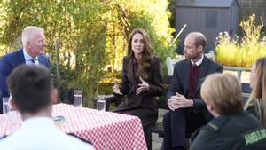 Britains Prince William and Kate, Princess of Wales, speak to members of the emergency services during a visit to Southport Community Centre to meet rescue workers and the families of those caught up in the Southport knife attack earlier this year in Southport, England, Thursday, Oct. 10, 2024. (Danny Lawson, Pool Photo via AP). POOL