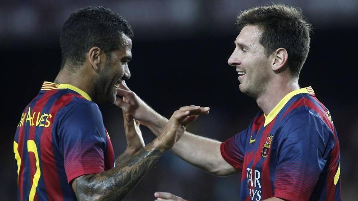 Dani Alves, junto a Leo Messi durante su etapa en el Barça