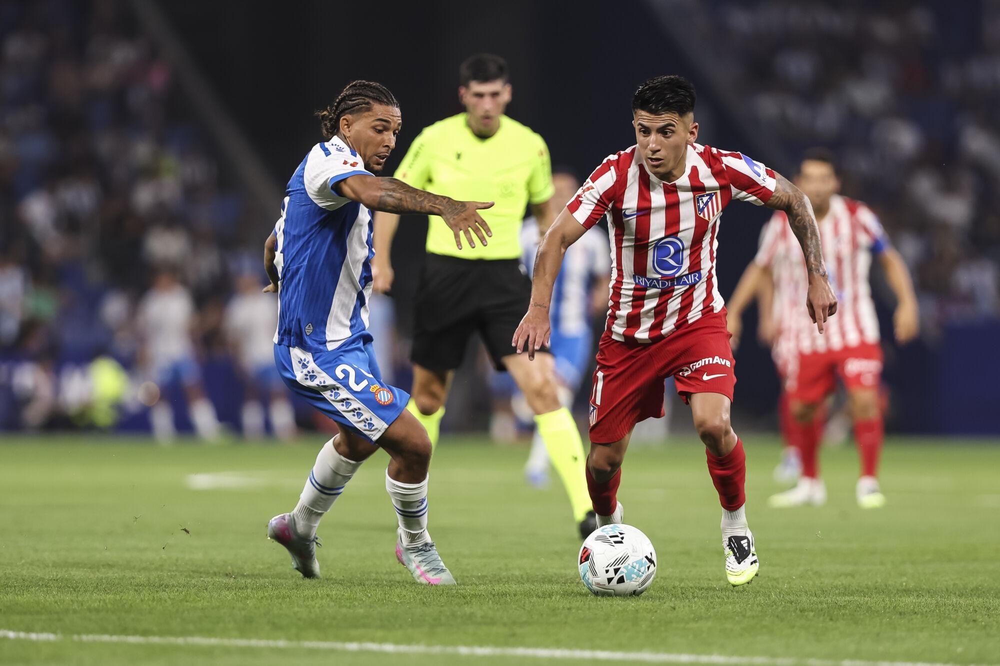Thiago Almada of Atletico de Madrid and Tyrhys Dolan of RCD Espanyol in action during the Spanish league, La Liga EA Sports, football match played between RCD Espanyol and Atletico de Madrid at RCDE Stadium on August 17, 2025 in Cornella, Barcelona, Spain. AFP7 17/08/2025 ONLY FOR USE IN SPAIN. Javier Borrego / AFP7 / Europa Press;2025;SPORT;ZSPORT;SOCCER;ZSOCCER;RCD Espanyol v Atletico de Madrid - La Liga EA Sports;