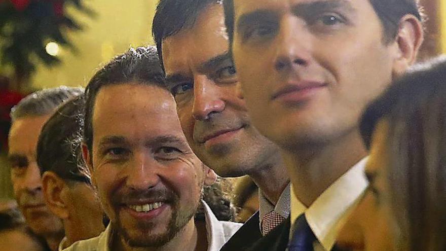 Iglesias, Herzog y Rivera, ayer, en el Congreso. // Efe