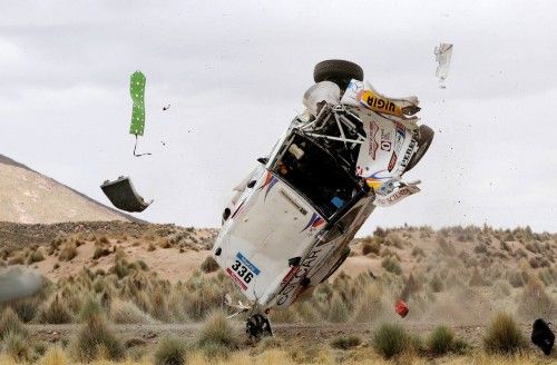 Juan Manuel Silva and Pablo Sisterna of Argentina crash in their Mercedes car during the 7th stage of the Dakar Rally from Iquique to Uyuni