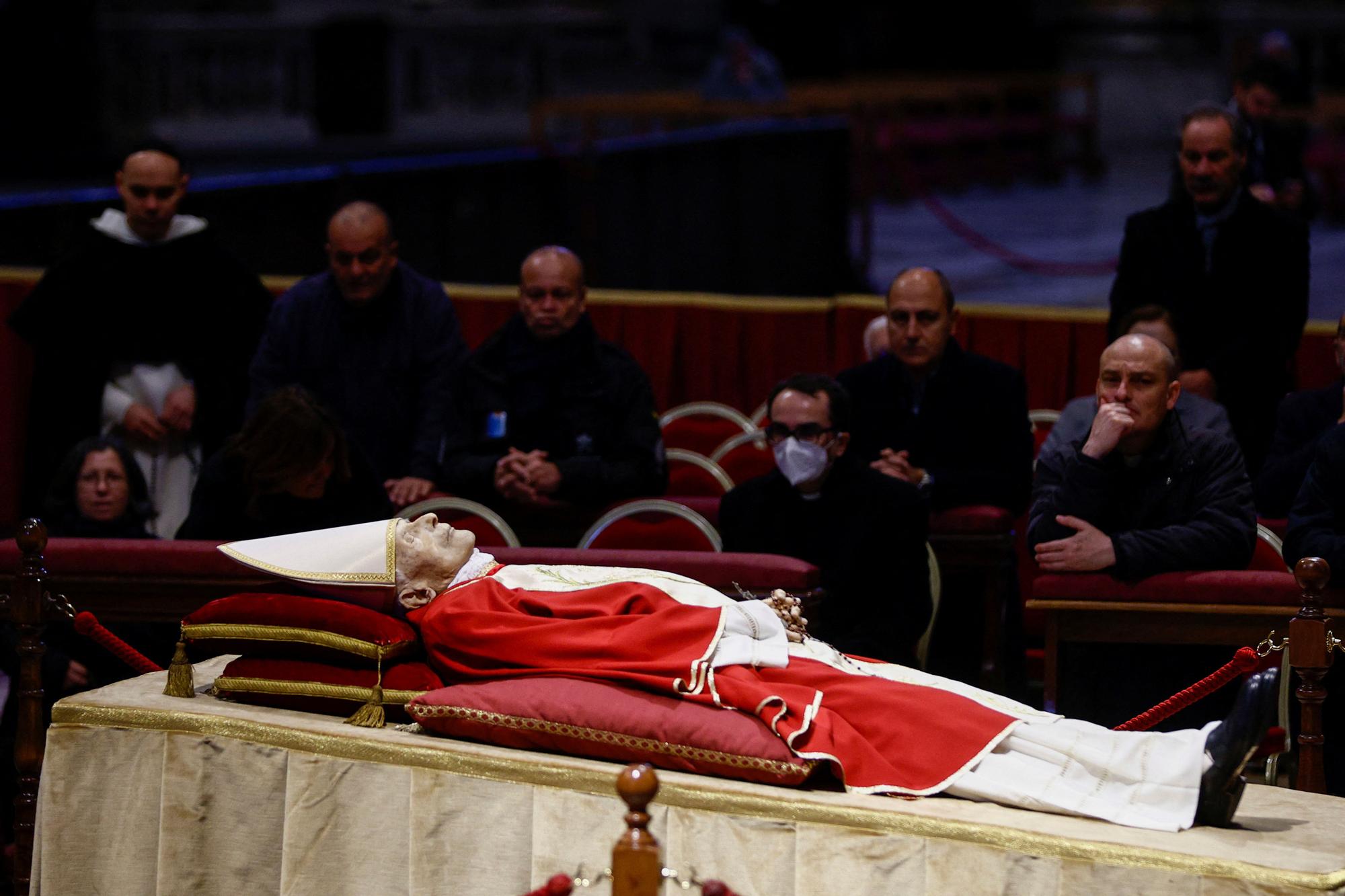 Faithful pay homage to former Pope Benedict in St. Peter's Basilica at the Vatican