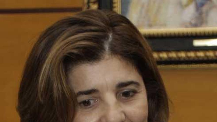 María Muñiz.