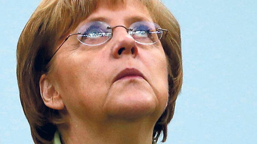 Merkel reconoce que la economía alemana se ralentiza.