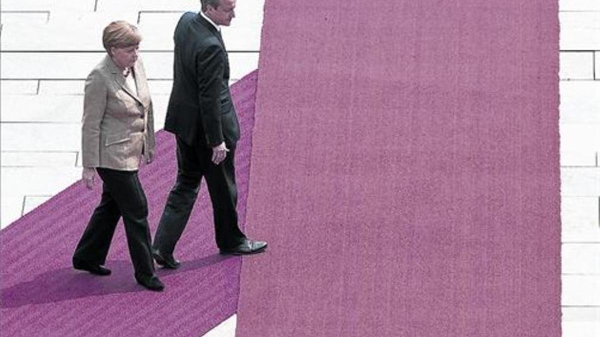 Merkel recibe con honores al primer ministro británico, David Cameron, antes de su reunión, en Berlín.