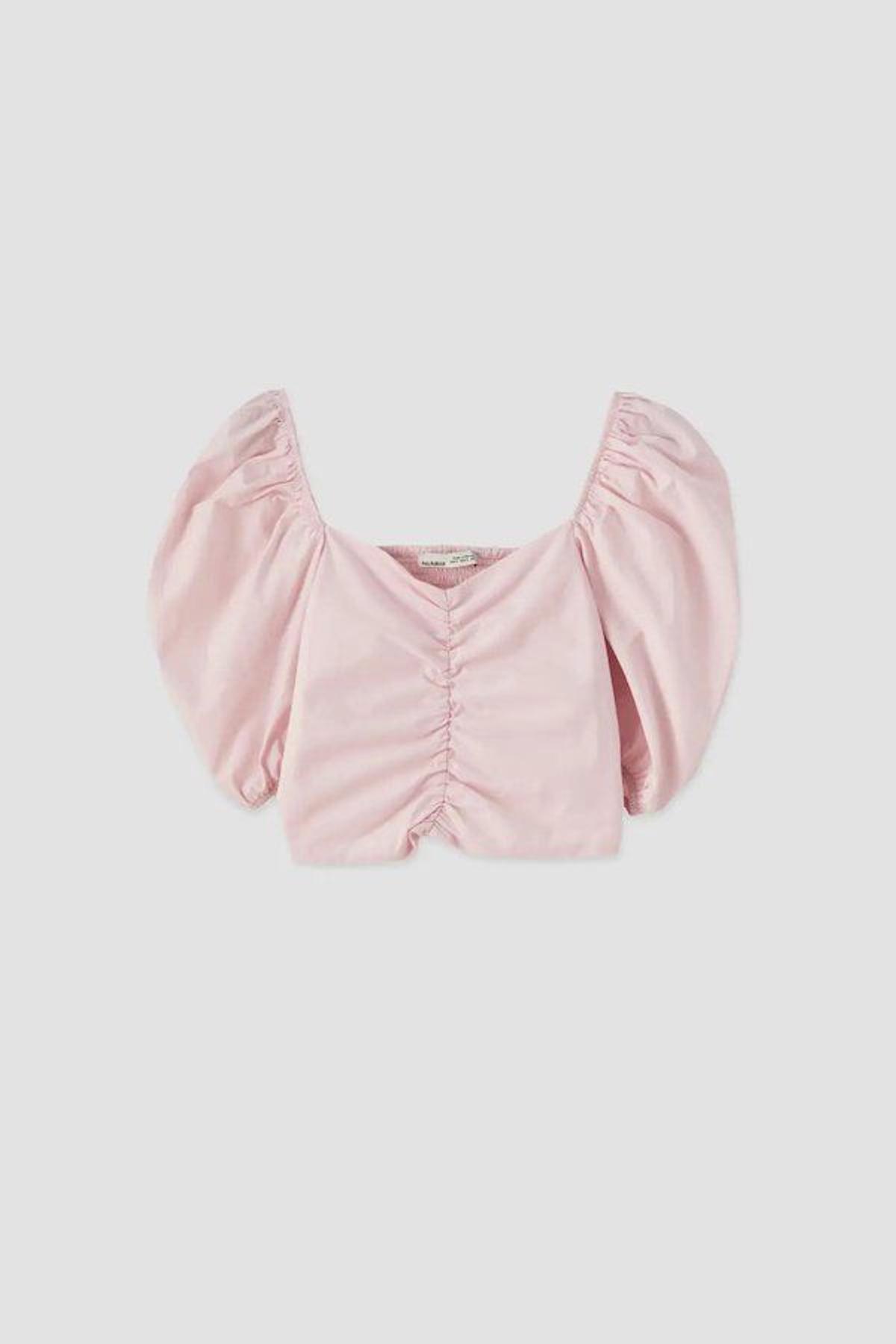 La blusa abullonada rosa