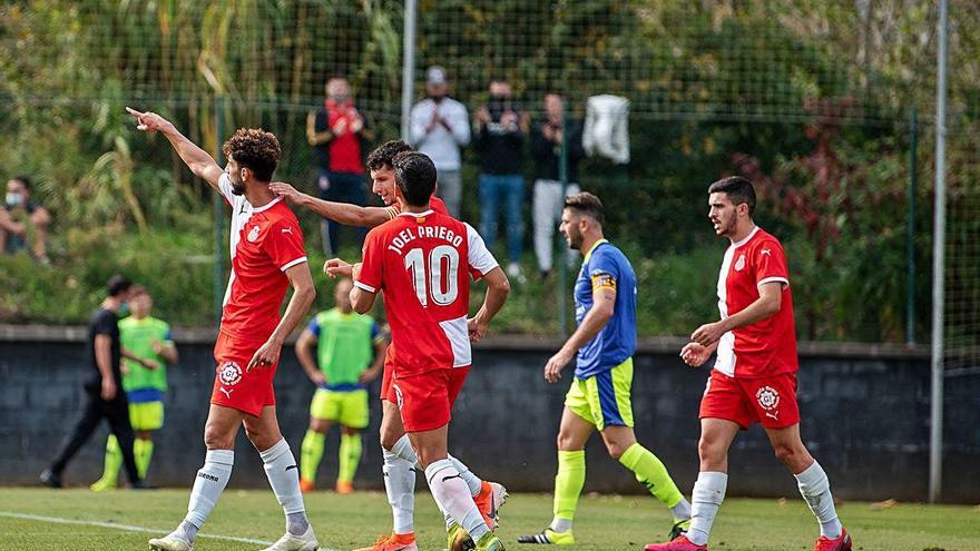 Àlex Pachón celebrant el primer gol del partit d&#039;ahir.