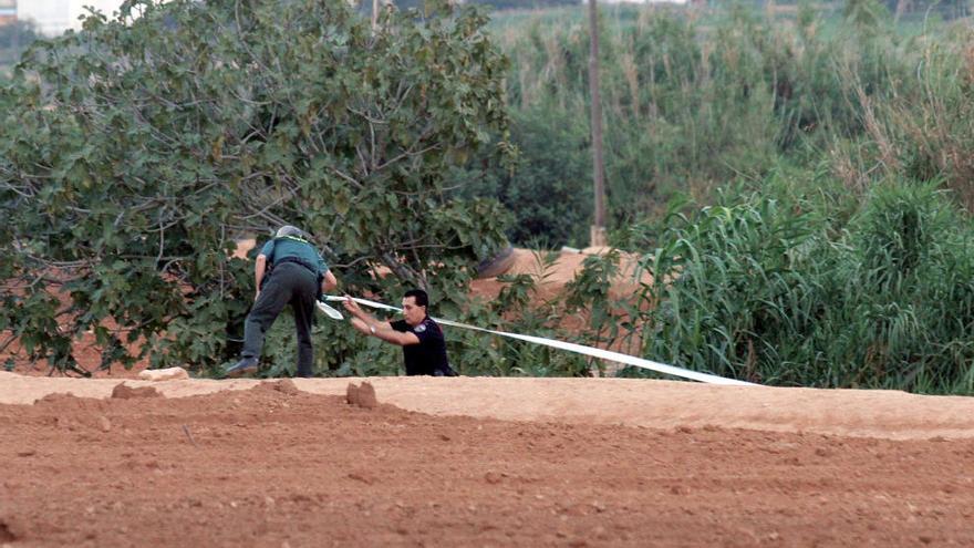 Los forenses, en el lugar del hallazgo