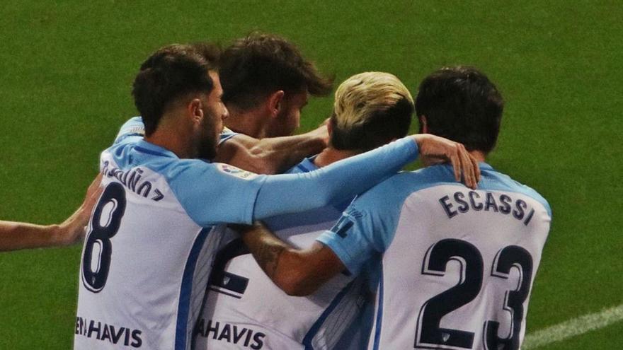 Los jugadores blanquiazules, celebrando el gol de Joaquín Muñoz ante el Rayo Vallecano.