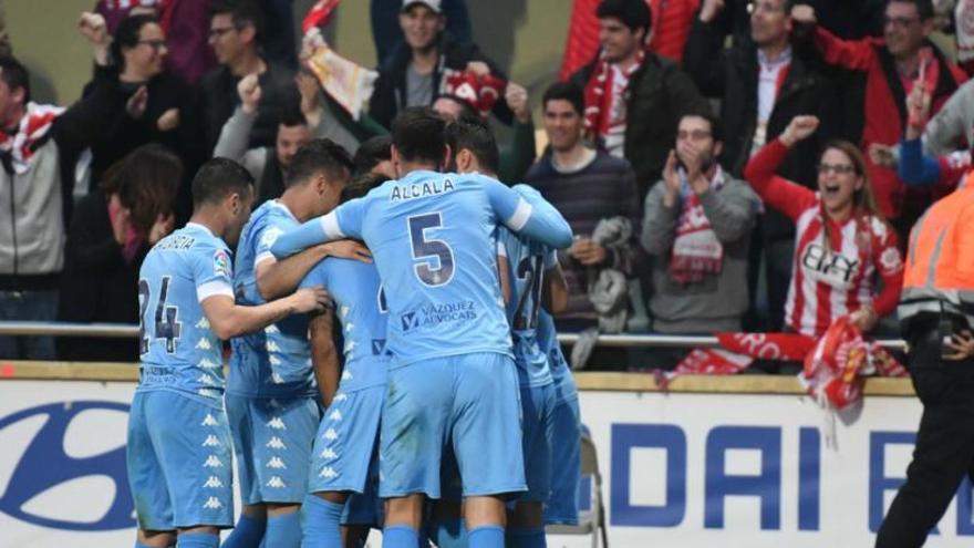 Jugadors del Girona celebren un dels gols d&#039;avui a Reus