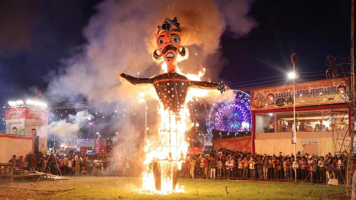 Fireworks explode as an effigy of Meghnad, son of demon king Ravana, burns during Vijaya Dashmi or Dussehra festival celebrations in the old quarters of Delhi