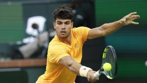 INDIAN WELLS (United States), 08/03/2026.- Carlos Alcaraz of Spain in action during the men’s singles match against Grigor Dimitrov of Bulgaria on day 4 of the BNP Paribas Open tennis tournament in Indian Wells, California, USA, 07 March 2026. (Tenis, España) EFE/EPA/JOHN G. MABANGLO