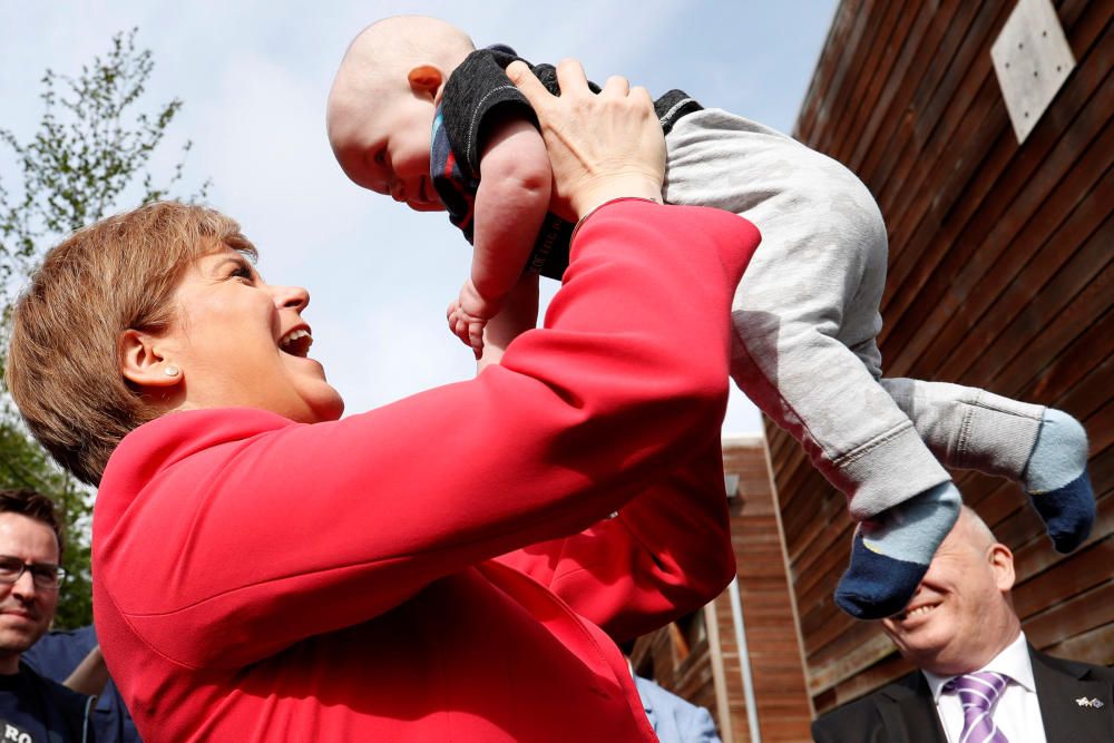 Scotland's First Minister Nicola Sturgeon holds ...