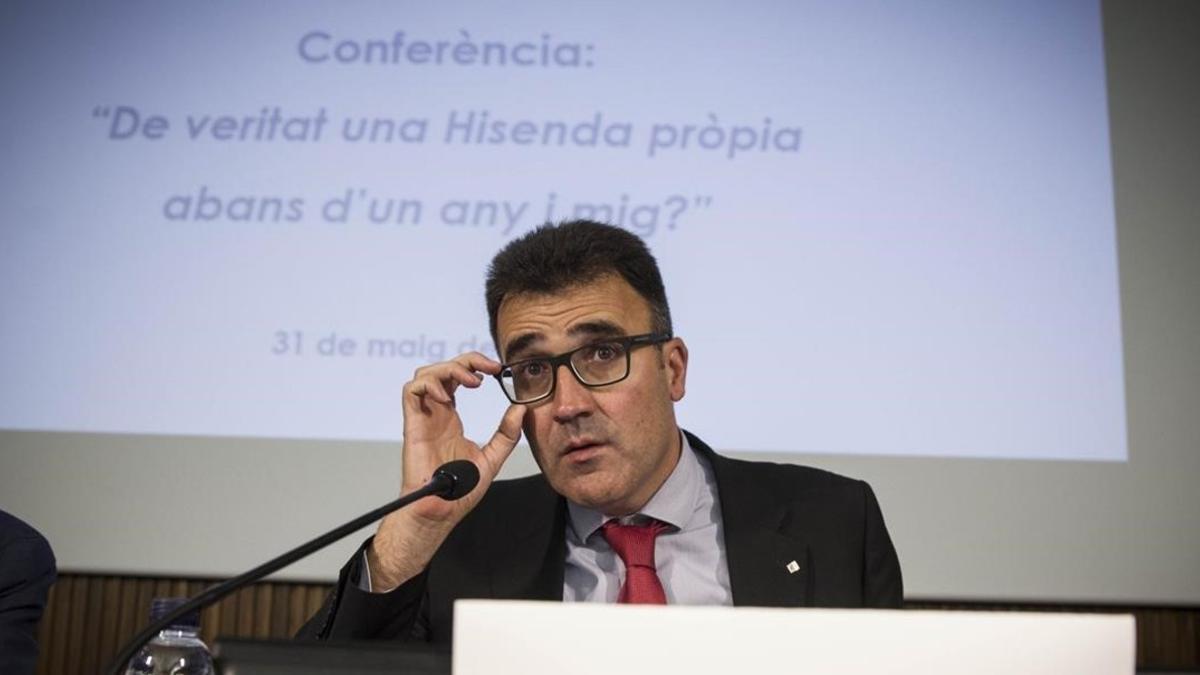 El secretario de Hacienda de la Generalitat,  LLuis Salvadó, ofrece una conferencia en el Col.legi d'Economistes de Catalunya.