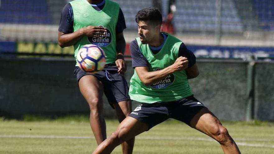 Sidnei y Juanfran, durante un entrenamiento en Abegondo.