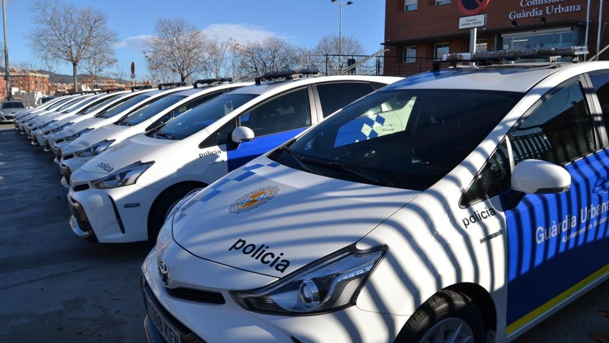 Coche de Guardia urbana y Policía local.