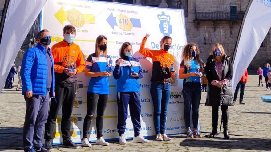 Belén Riádigos y Cristina Couto, en el podio del Obradoiro. |
