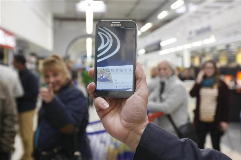 Fotogalería: Los premios de la lotería se dejan caer por la provincia