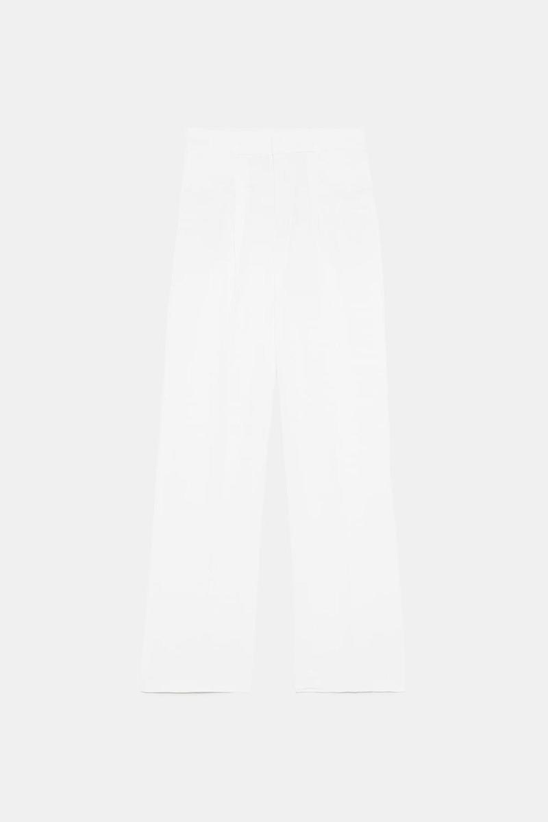 Pantalón blanco ancho de lino de Zara. (Precio: 49, 95 euros)