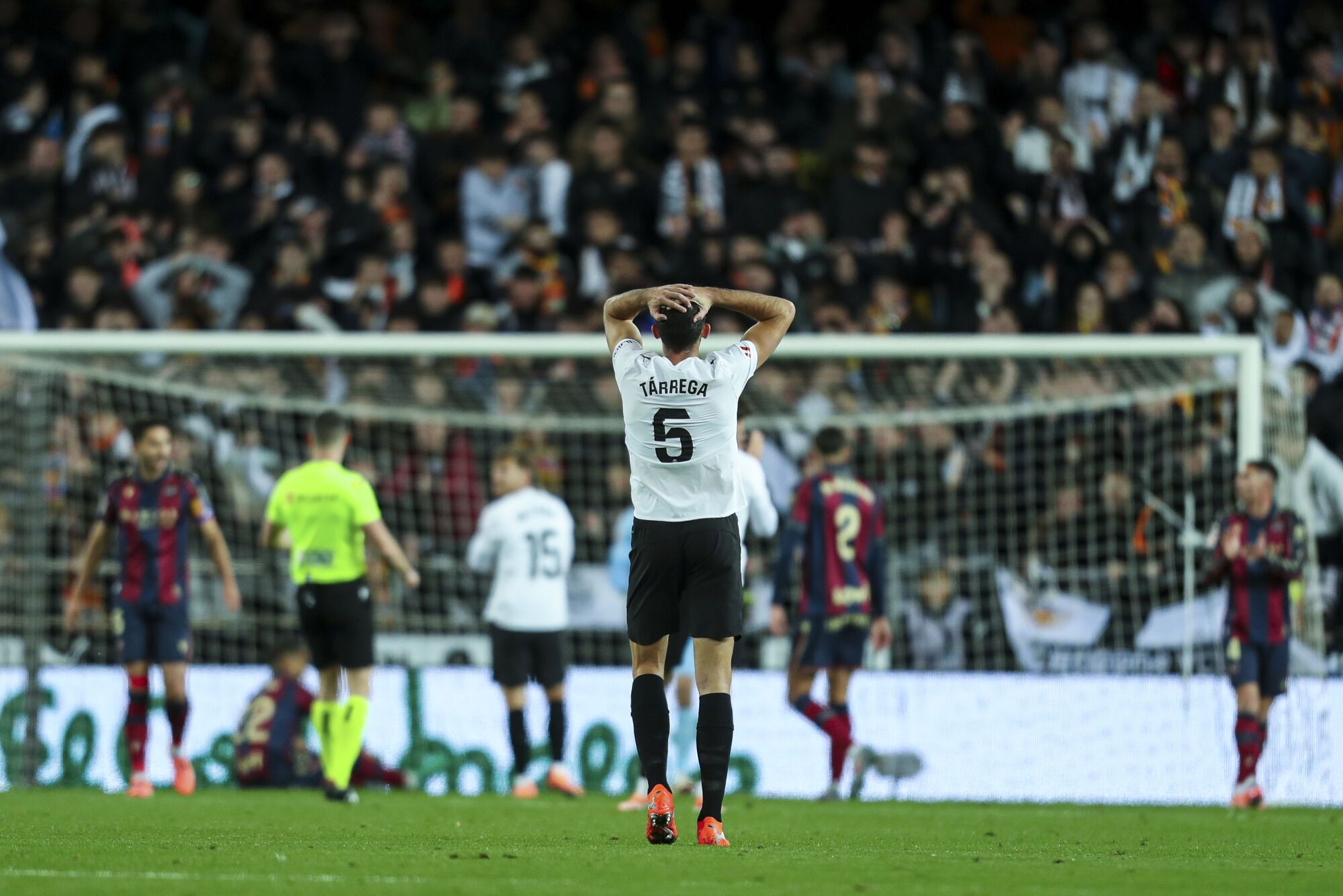 Cesar Tarrega of Valencia CF laments during the Spanish league, La Liga EA Sports, football match played between Valencia CF and UD Levante at Mestalla stadium on November 21, 2025, in Valencia, Spain. AFP7 21/11/2025 ONLY FOR USE IN SPAIN. Ivan Terron / AFP7 / Europa Press;2025;SOCCER;SPORT;ZSOCCER;ZSPORT;Valencia CF V UD Levante - La Liga EA Sport;